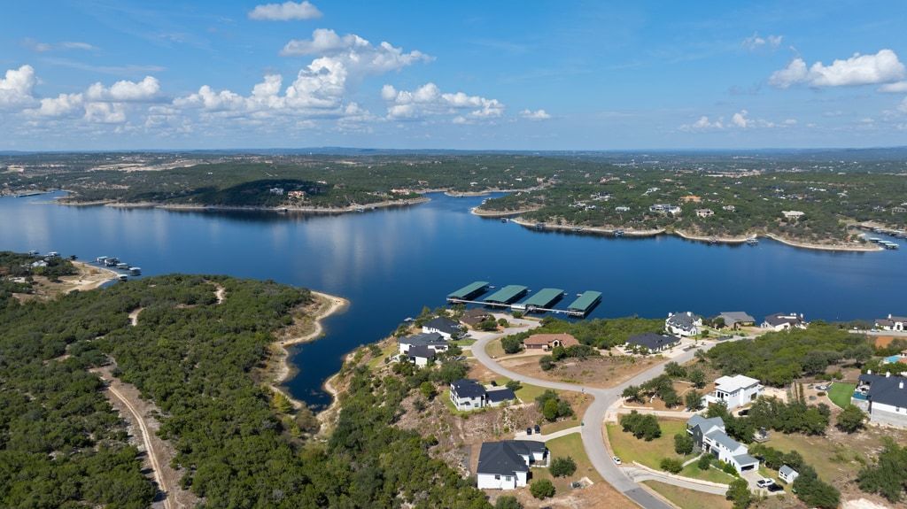 406 Summit Ridge Drive North Lago Vista, TX 78645 - Photo 25 of 25 a view of a lake with a lake