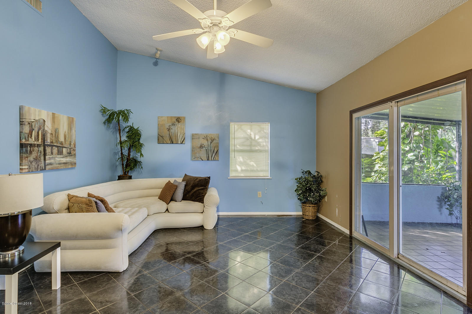 141 Virginia Road West Melbourne, FL 32904 - Photo 16 of 34 Sliders to the Back