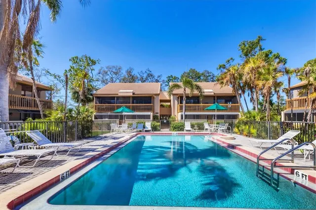 a view of a house with swimming pool