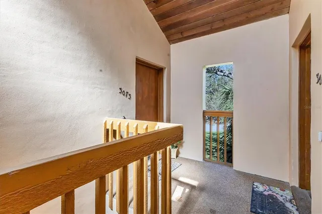 a view of balcony with furniture