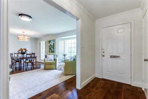 a view of a livingroom with furniture and windows