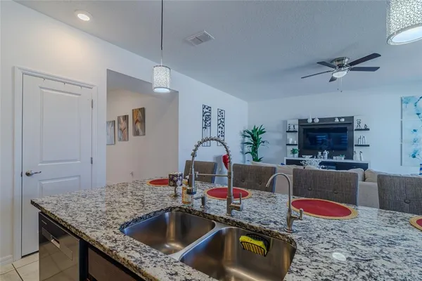 a living room with furniture and a table