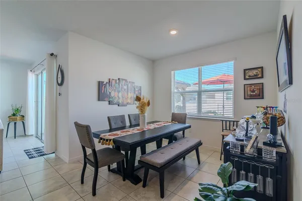 a bedroom with a bed and flat screen tv
