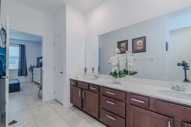 a bedroom with a bed and a cabinets