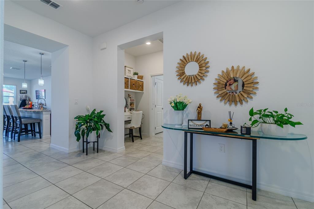 7095 Southwest 61st Place Ocala, FL 34474 - Photo 40 of 61 a view of a room with kitchen island table and chairs