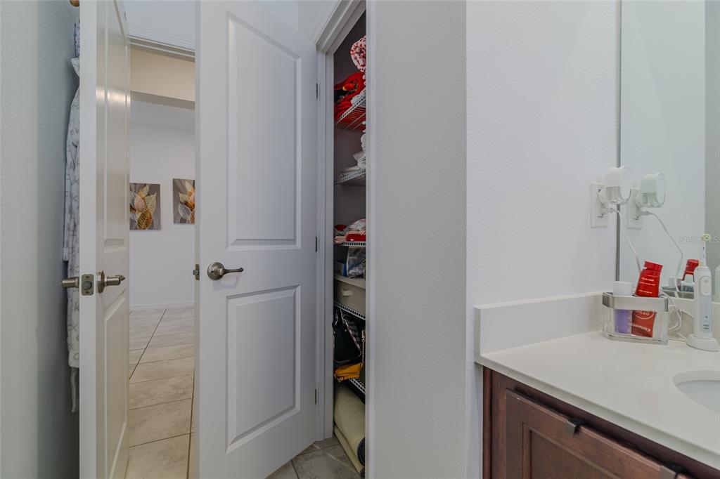7095 Southwest 61st Place Ocala, FL 34474 - Photo 41 of 61 a bathroom with a sink vanity and a shower