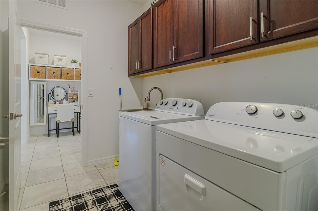 7095 Southwest 61st Place Ocala, FL 34474 - Photo 48 of 61 a utility room with dryer and washer