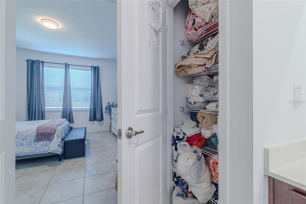 7095 Southwest 61st Place Ocala, FL 34474 - Photo 55 of 61 a bedroom with a bed and a window