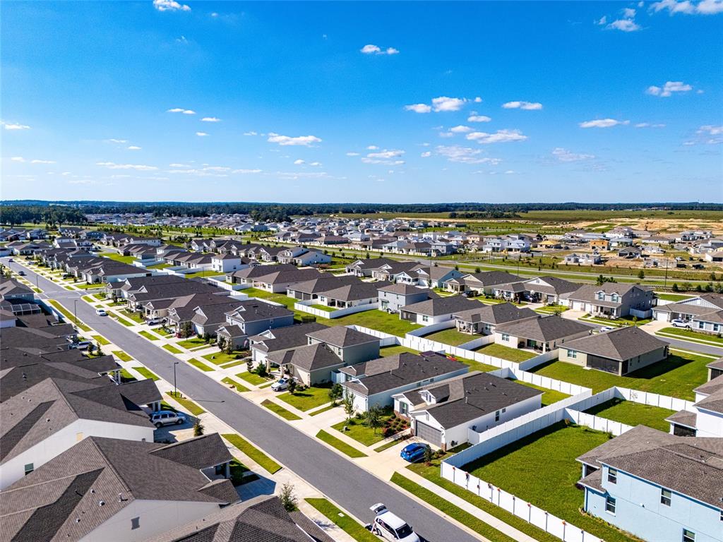 7095 Southwest 61st Place Ocala, FL 34474 - Photo 61 of 61 an aerial view of a city