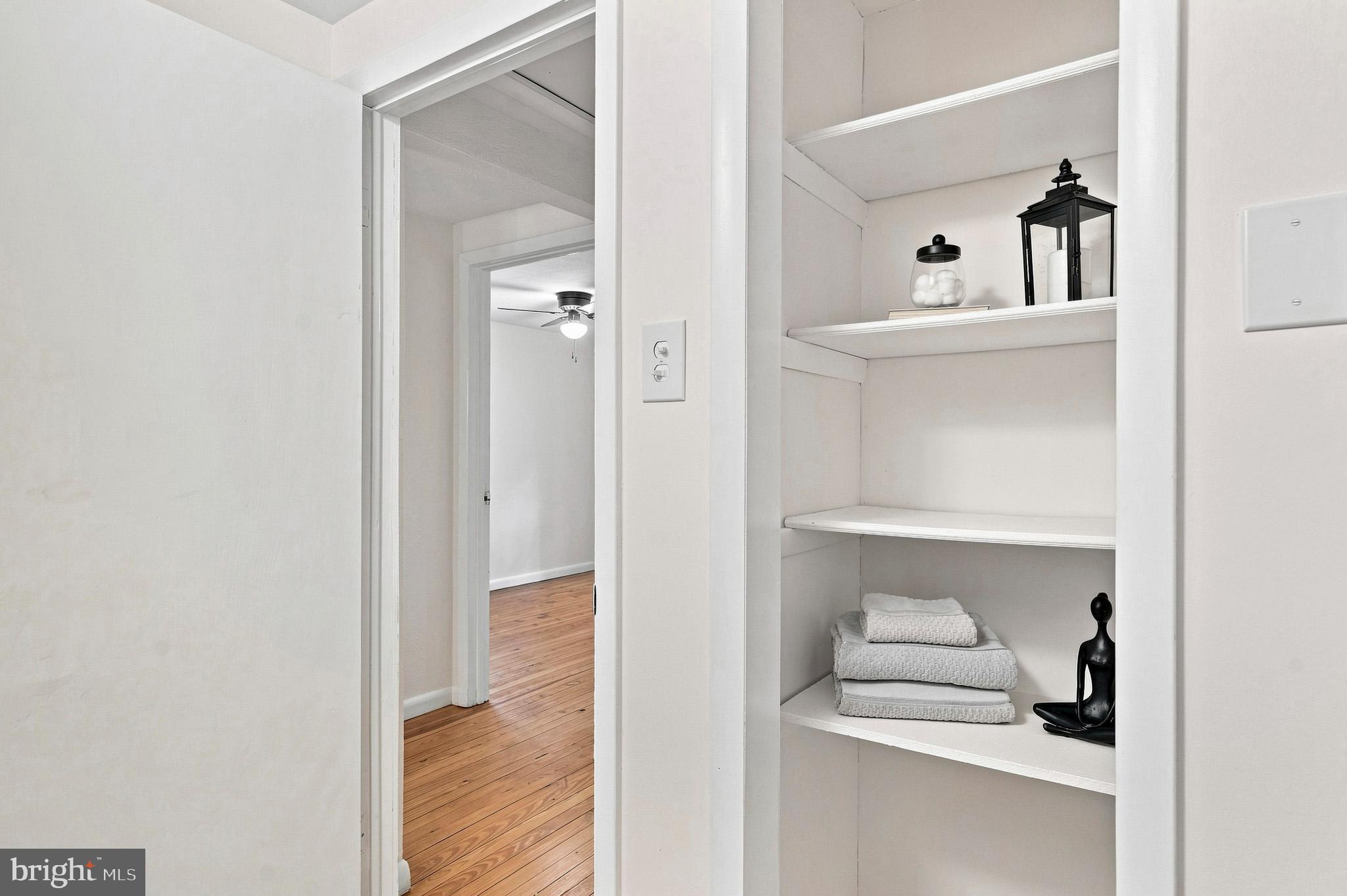 11407 Rawhide Road Lusby, MD 20657 - Photo 16 of 64 Charming storage area in the full bath.