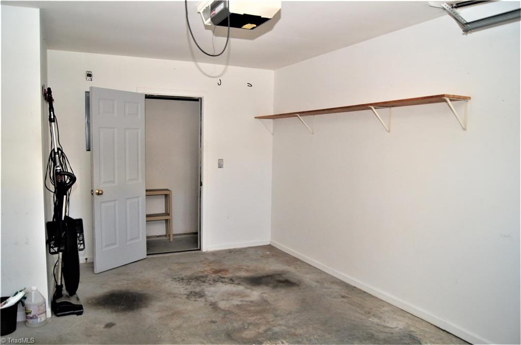 4320 Riverside Drive Clemmons, NC 27012 - Photo 18 of 20 Single car garage with extra storage space
