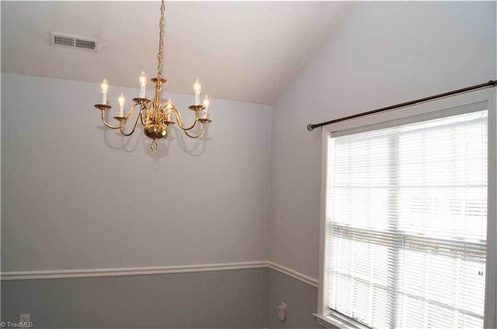 4320 Riverside Drive Clemmons, NC 27012 - Photo 9 of 20 Dining room showing vaulted ceiling