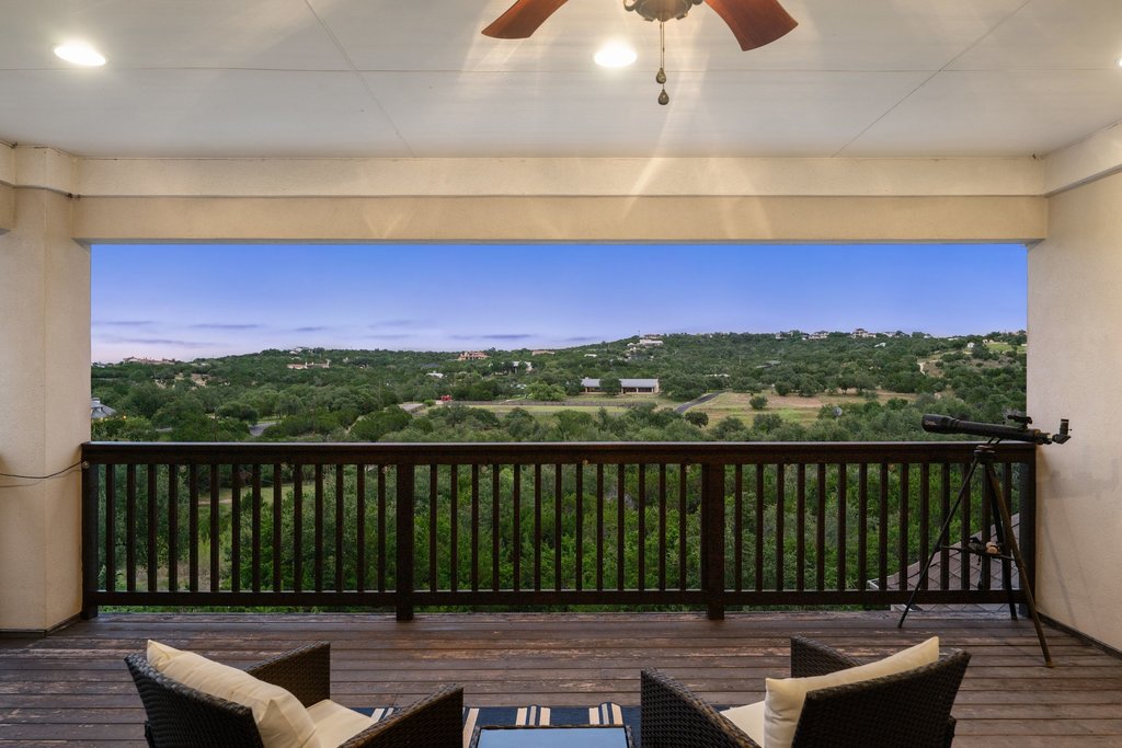 215 Lodestone Lane Austin, TX 78738 - Photo 9 of 40 An expansive private balcony offers picturesque views of the hill country.