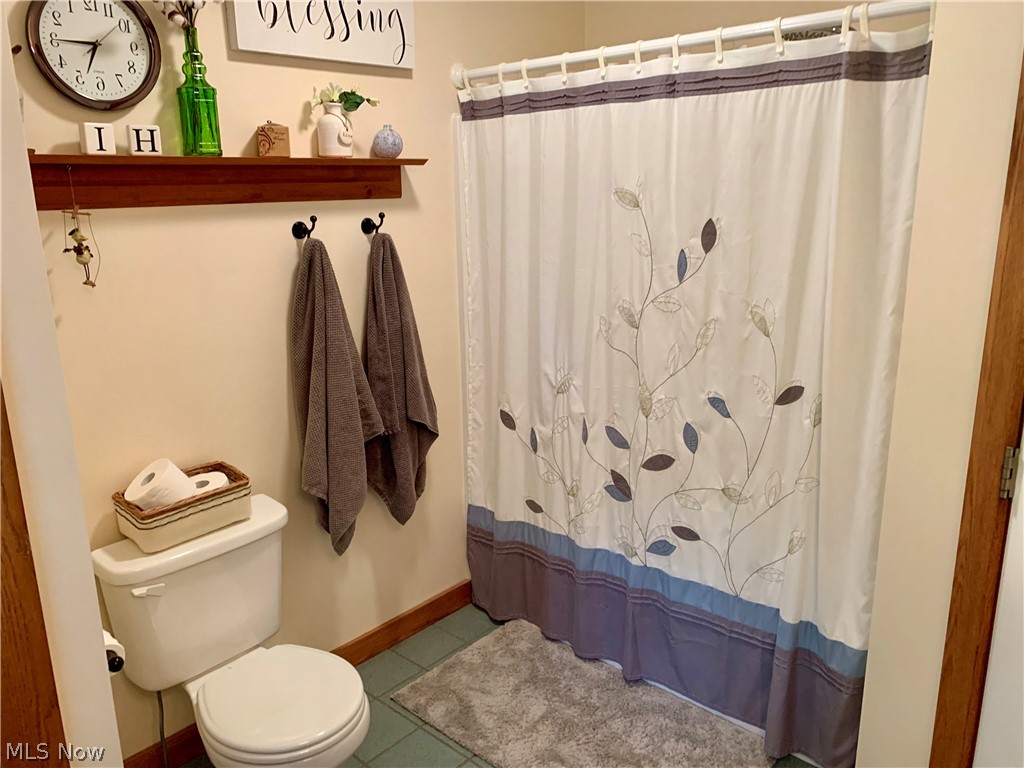 373 South Ridge Road West Conneaut, OH 44030 - Photo 23 of 50 Bathroom featuring tile flooring and toilet