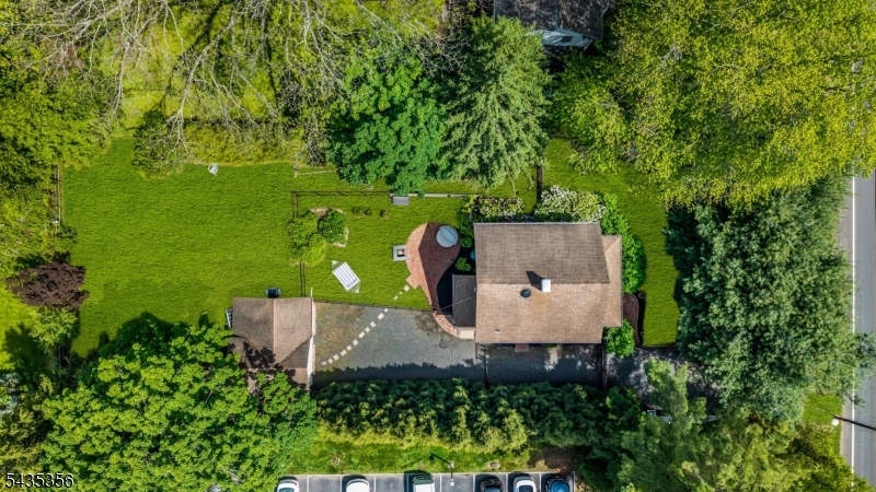 105 Somerville Road Bedminster, NJ 07921 - Photo 35 of 36 an aerial view of a house with a yard and trees