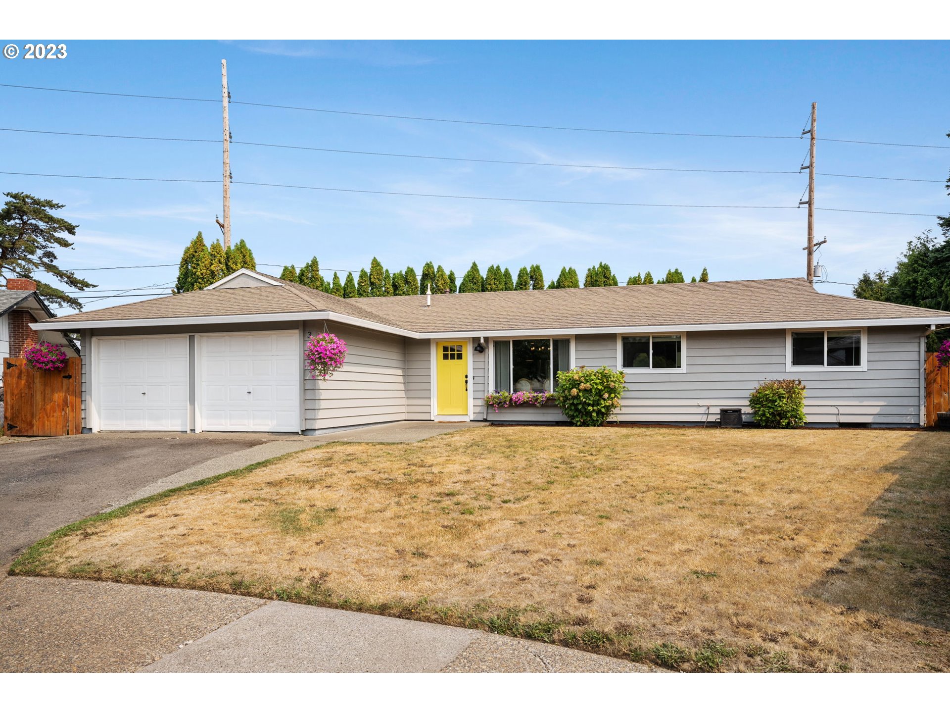 326 Southeast 236th Court Gresham, OR 97030 - Photo 2 of 34 a view of a house with a patio