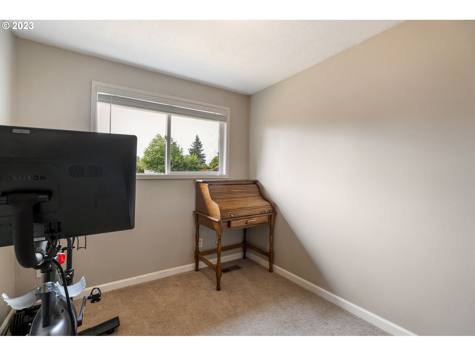 326 Southeast 236th Court Gresham, OR 97030 - Photo 22 of 34 a room with furniture and a window