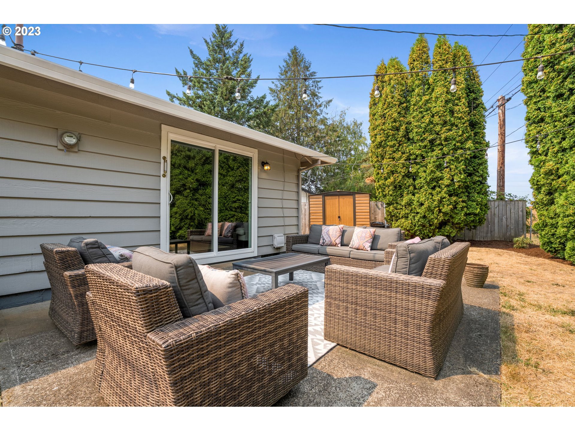 326 Southeast 236th Court Gresham, OR 97030 - Photo 26 of 34 a view of a patio with couches and potted plants