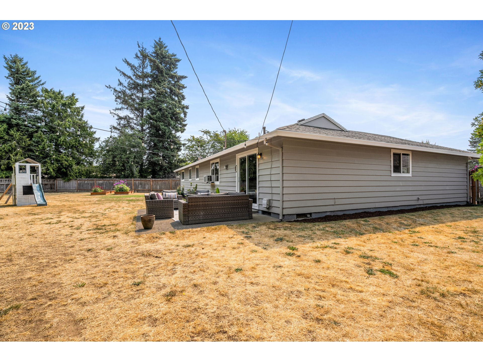 326 Southeast 236th Court Gresham, OR 97030 - Photo 28 of 34 a view of a backyard of the house