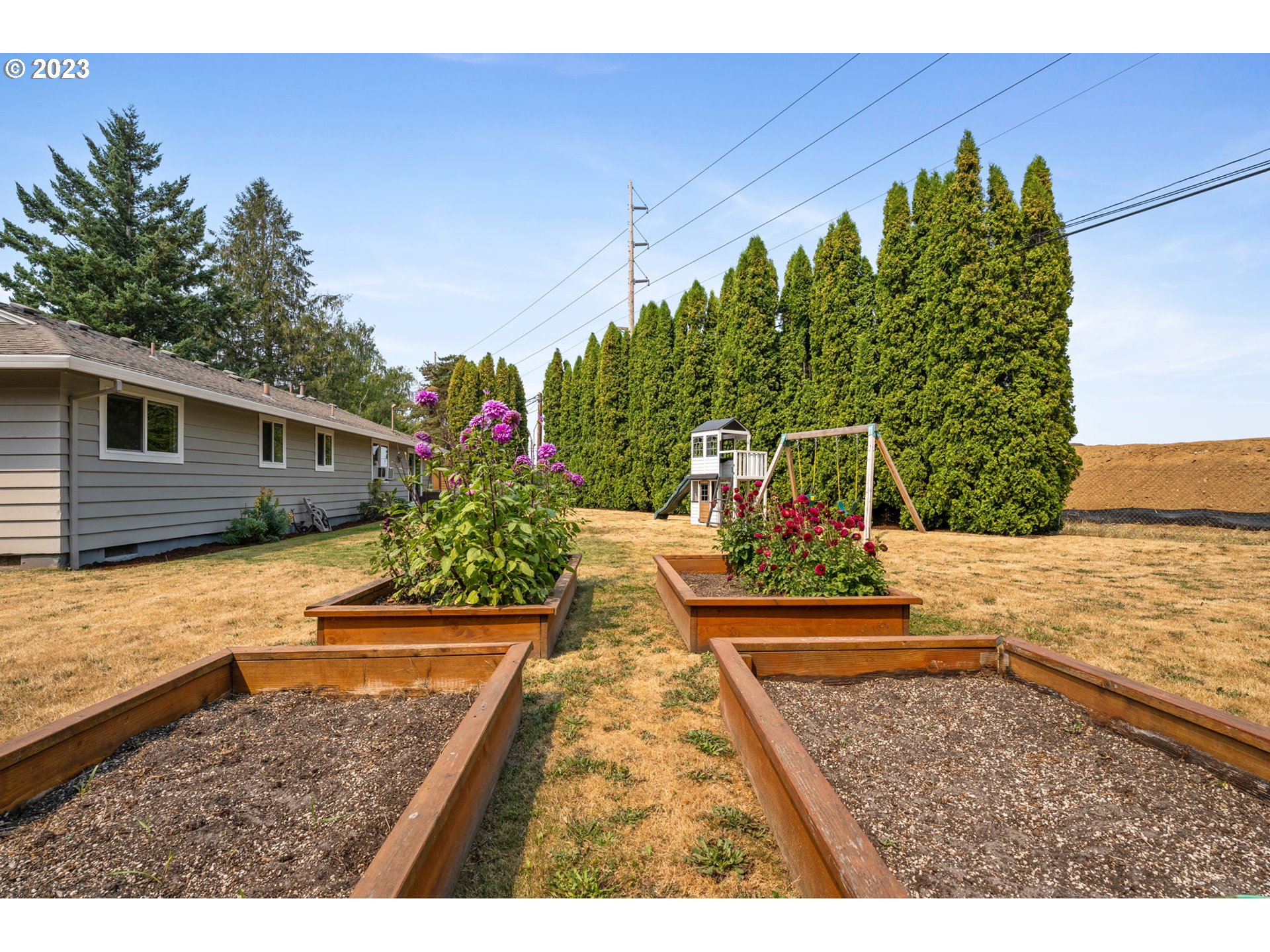 326 Southeast 236th Court Gresham, OR 97030 - Photo 33 of 34 a view of a house with backyard