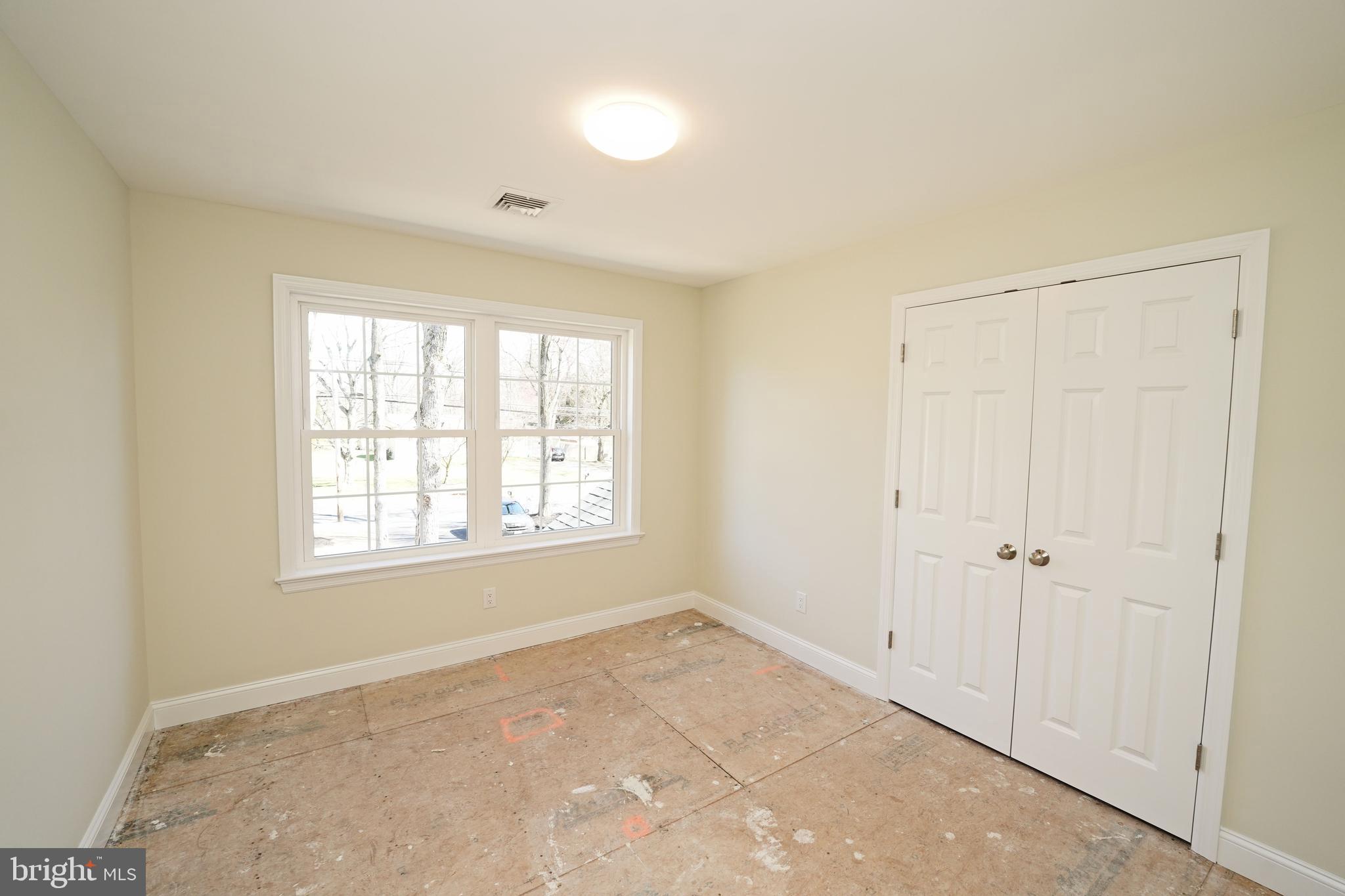 1341 Lower Ferry Road Ewing, NJ 08618 - Photo 25 of 39 a view of an empty room with a window