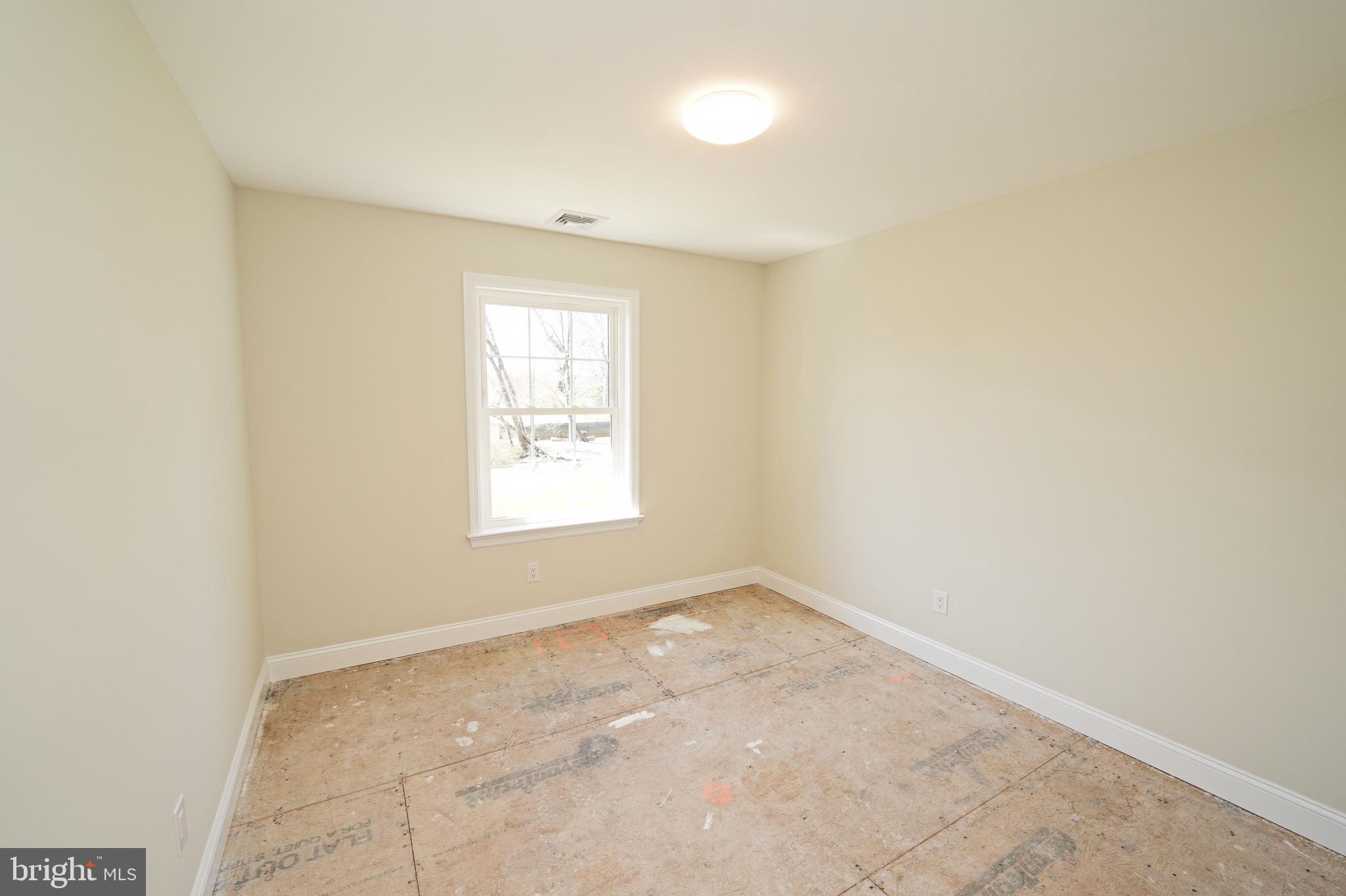 1341 Lower Ferry Road Ewing, NJ 08618 - Photo 27 of 39 an empty room with a window
