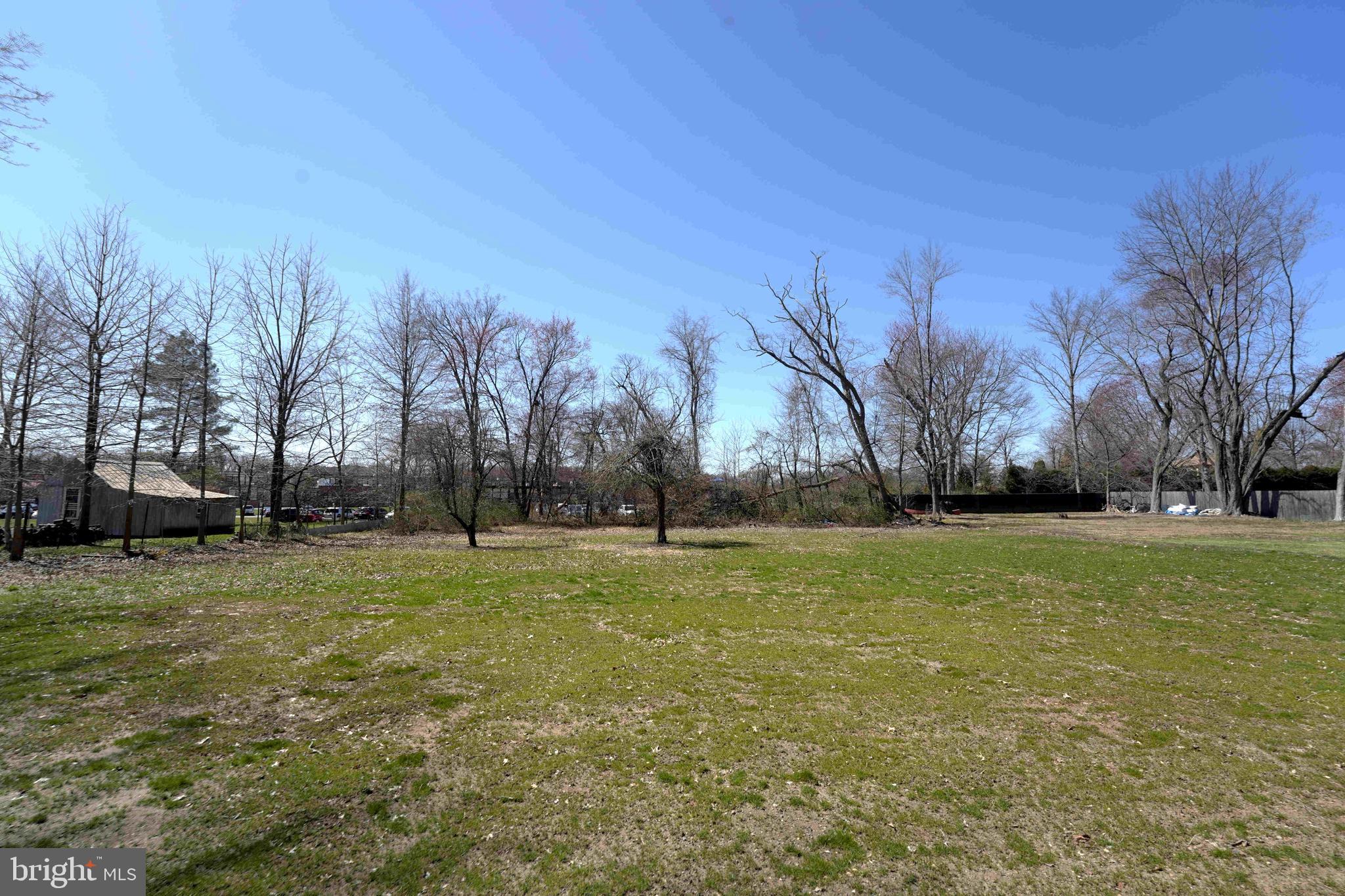 1341 Lower Ferry Road Ewing, NJ 08618 - Photo 36 of 39 a view of a field with trees in the background