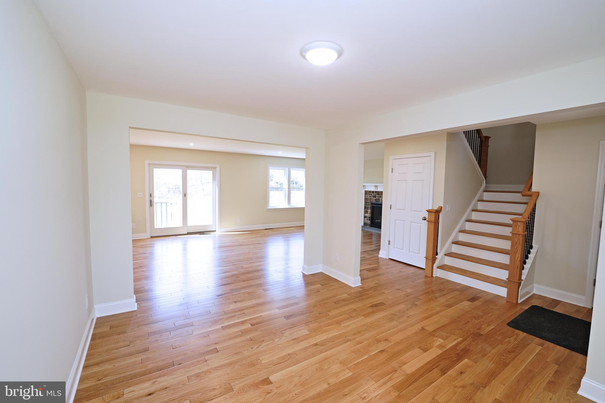 1341 Lower Ferry Road Ewing, NJ 08618 - Photo 7 of 39 wooden floor in an empty room with a window