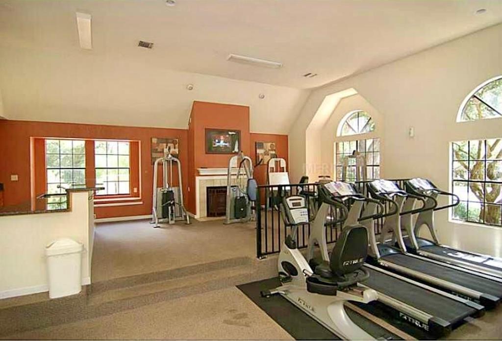 365 Forestway Circle, Unit 101 Altamonte Springs, FL 32701 - Photo 11 of 16 a view of a room with gym equipment