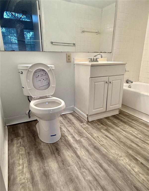 365 Forestway Circle, Unit 101 Altamonte Springs, FL 32701 - Photo 8 of 16 a bathroom with a sink and a toilet