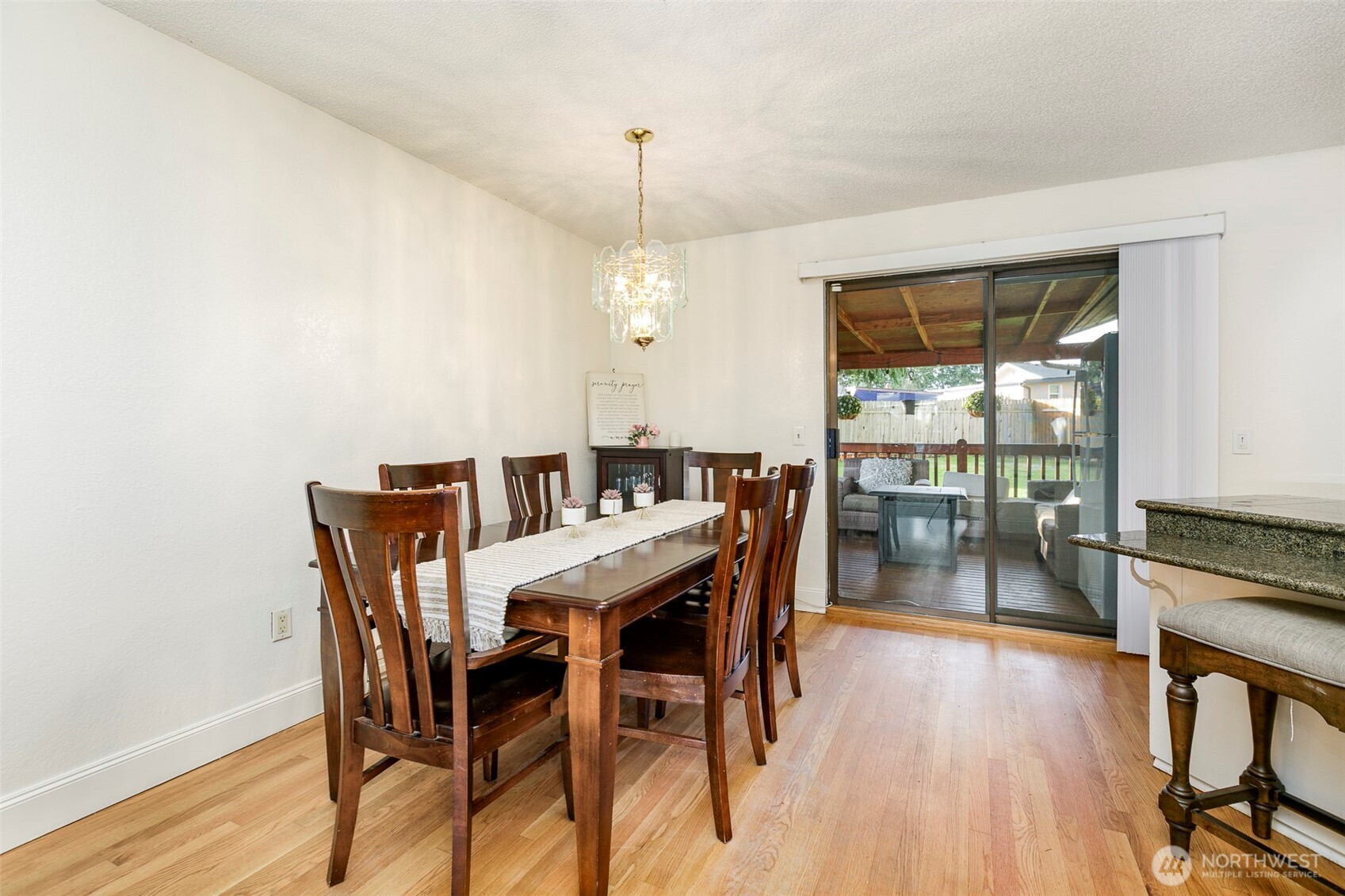 4003 Northeast 6th Court Renton, WA 98056 - Photo 6 of 20 a dining room with furniture and wooden floor