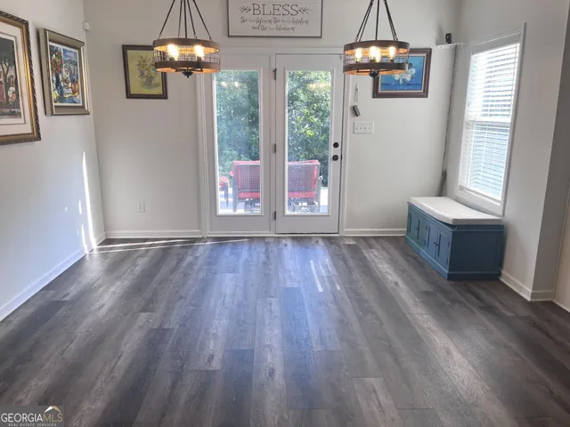 a bathroom with a toilet and a sink