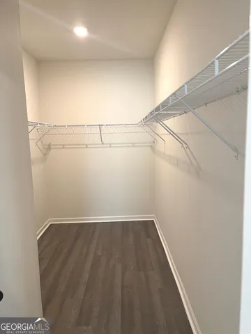 a picture of a wall with a white wall and a painting