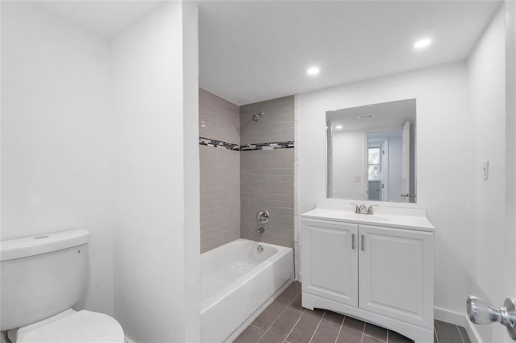 3751 Environ Boulevard, Unit 243 Lauderhill, FL 33319 - Photo 18 of 24 a bathroom with a sink a toilet and shower