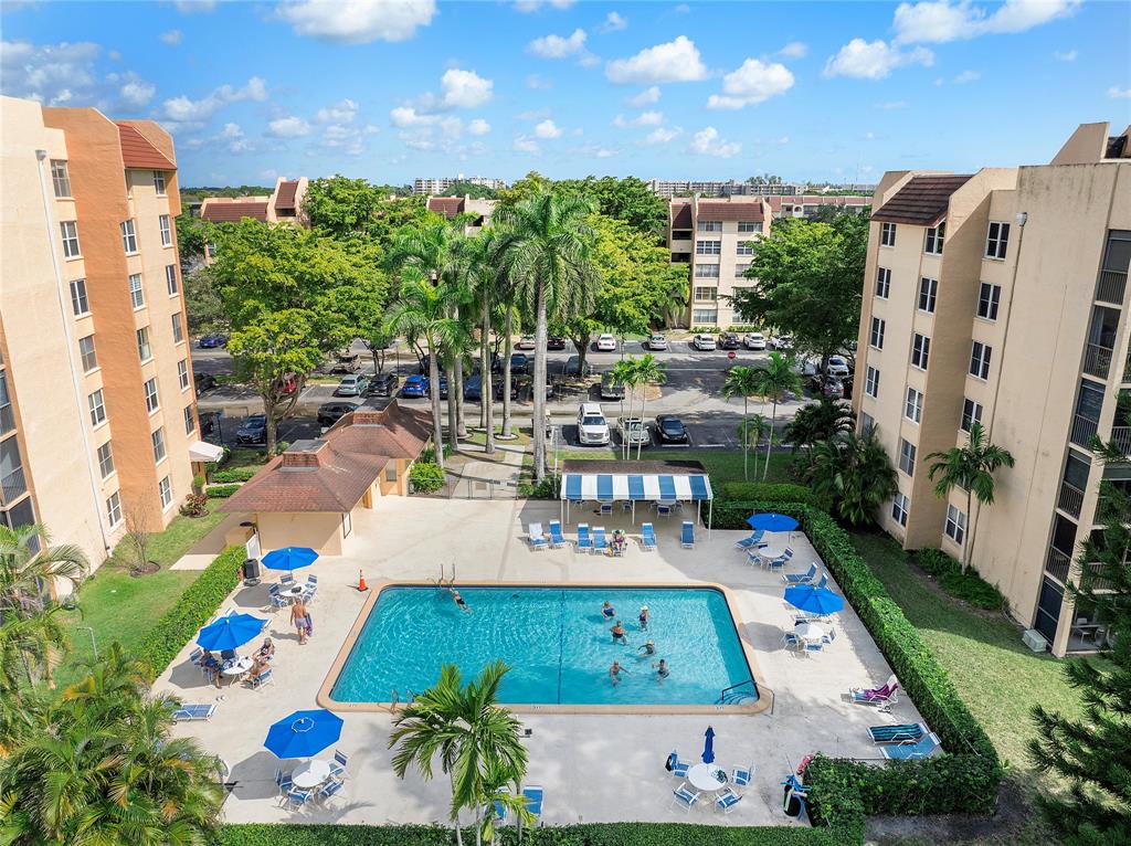 3751 Environ Boulevard, Unit 243 Lauderhill, FL 33319 - Photo 21 of 24 a view of swimming pool with outdoor seating