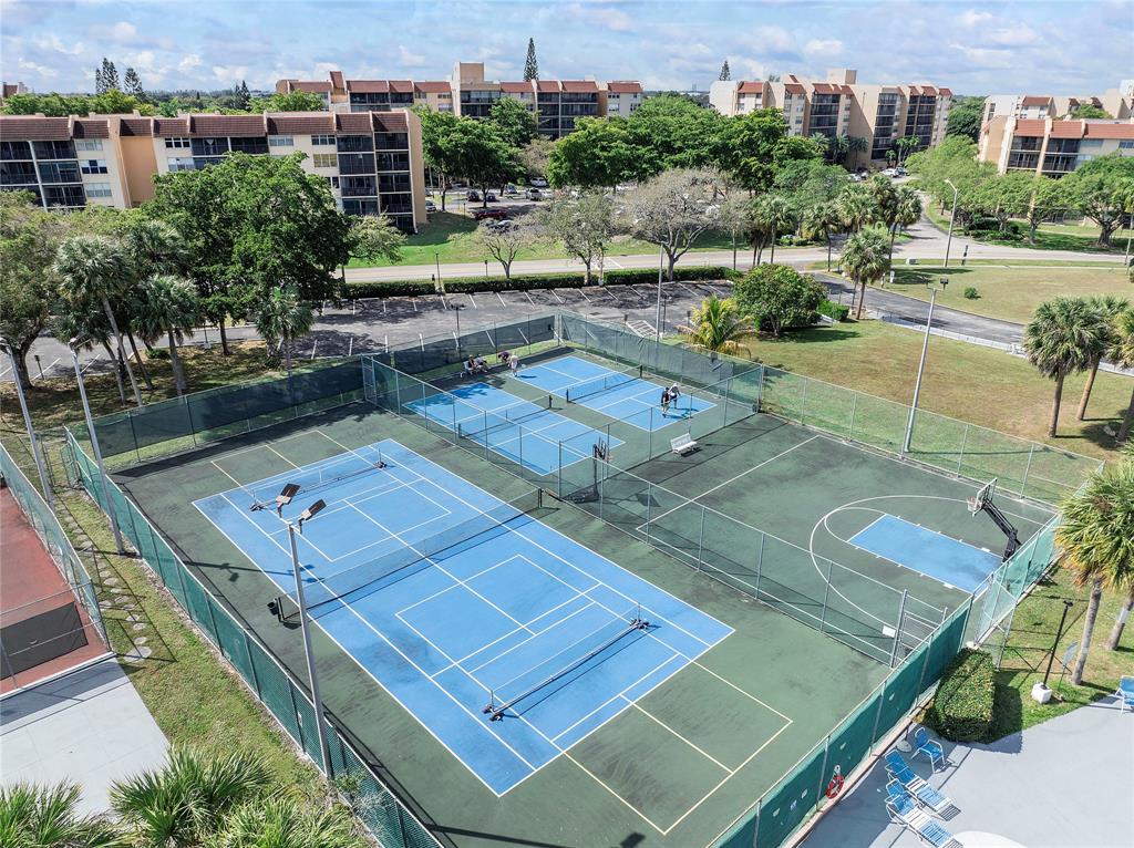 3751 Environ Boulevard, Unit 243 Lauderhill, FL 33319 - Photo 23 of 24 a view of a tennis court