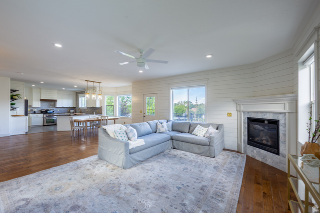 868 Braddock Lane Alpine, UT 84004 - Photo 22 of 64 Open-concept living area featuring rich wood-finish flooring, recessed lighting, and a ceiling fan