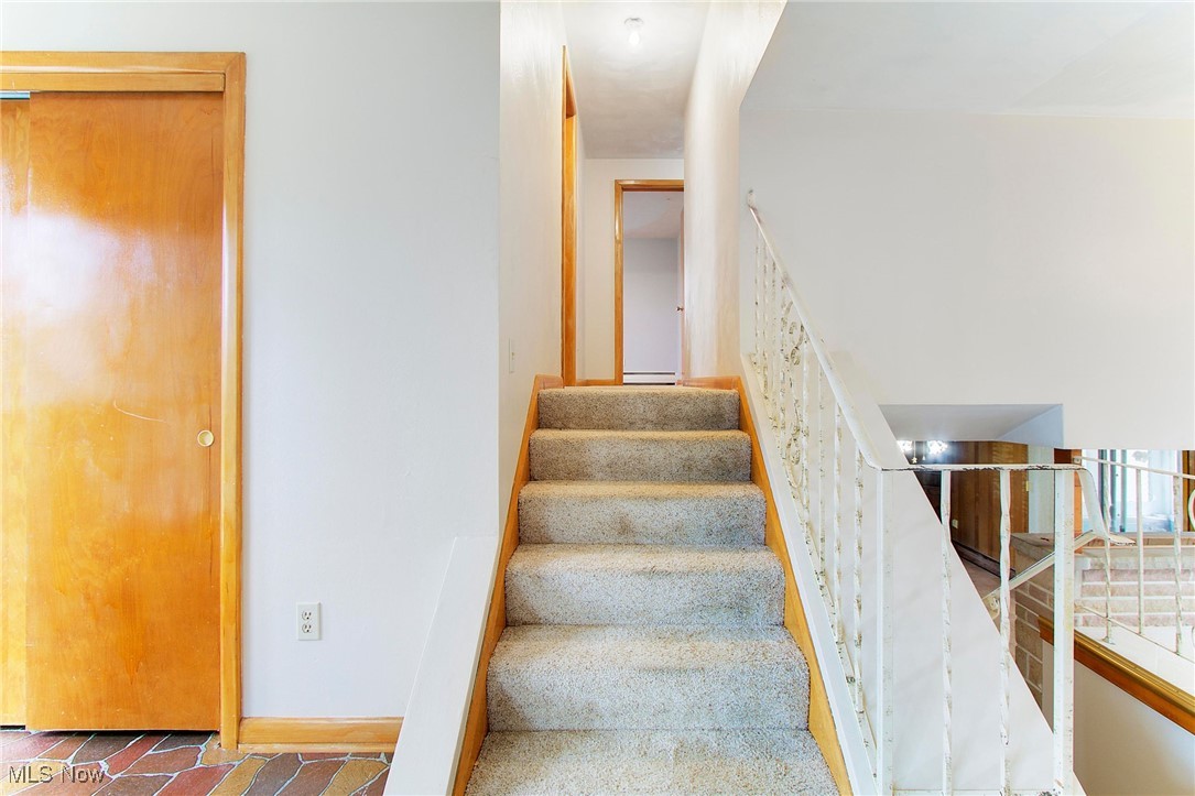 5334 Ridge Avenue Southeast Canton, OH 44707 - Photo 24 of 47 Stairway leading to the second level.