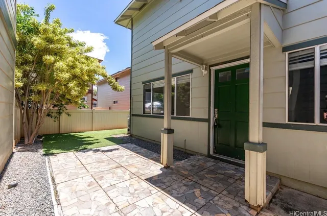 a view of a pathway with a house