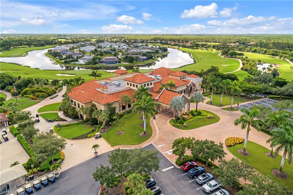 9719 Acqua Court, Unit 214 Naples, FL 34113 - Photo 48 of 50 an aerial view of residential houses with outdoor space and river