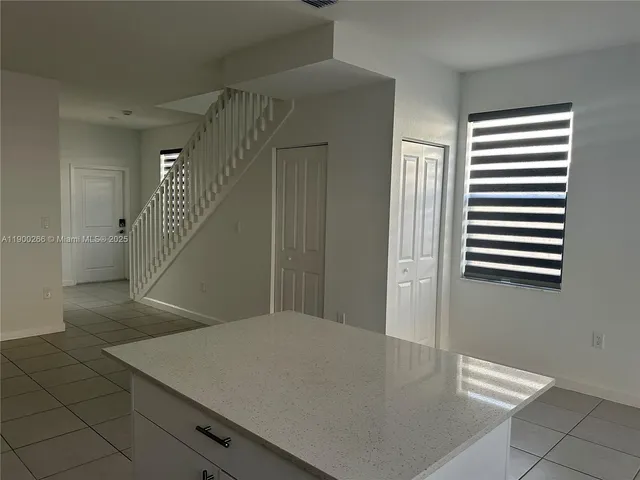 a view of a hallway with entryway