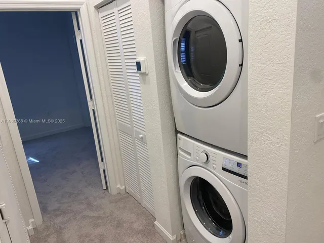 a room with a table and chairs