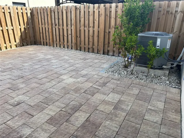 a view of a backyard of the house