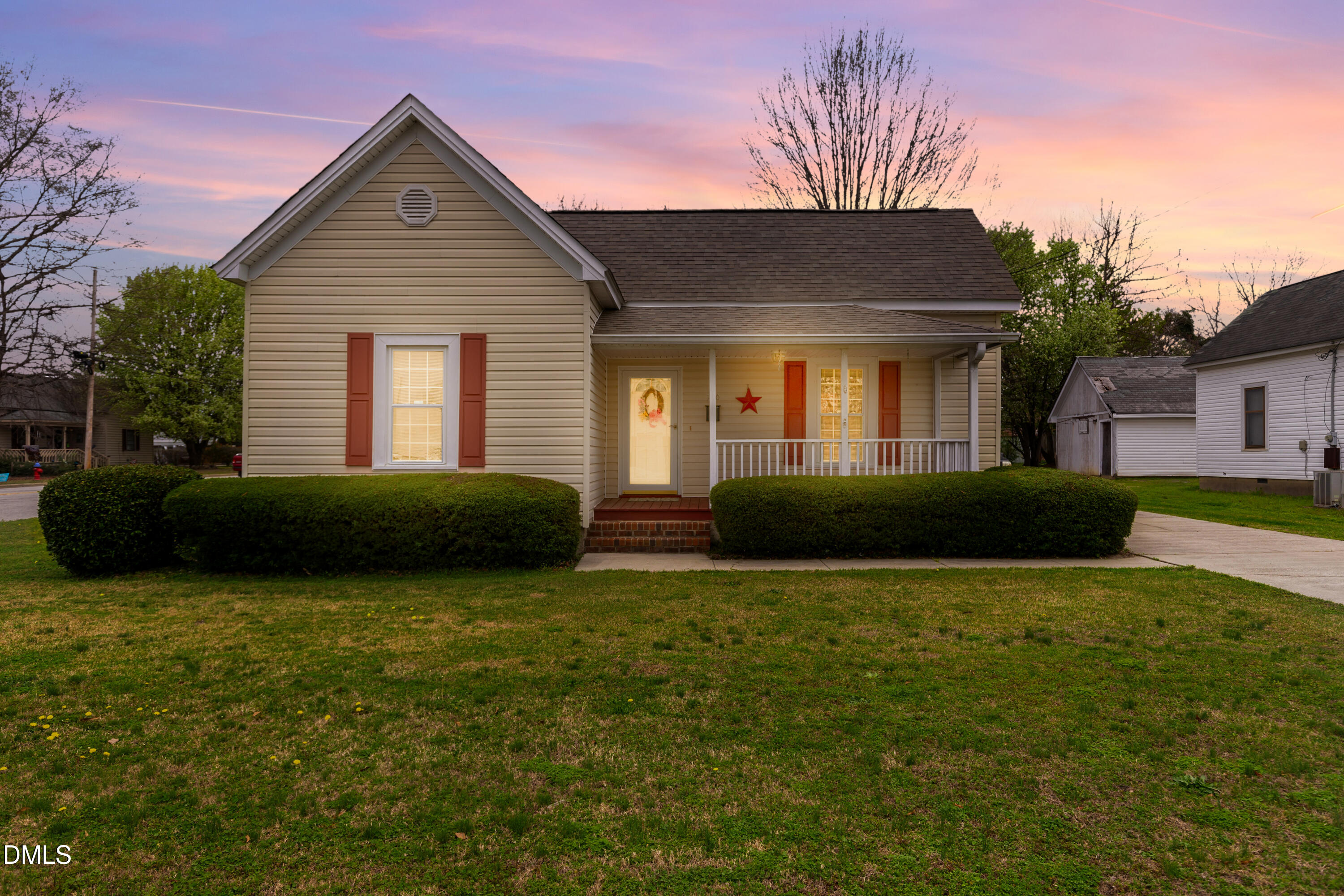 100 East E Street Erwin, NC 28339 - Photo 1 of 27 a view of a house with a yard