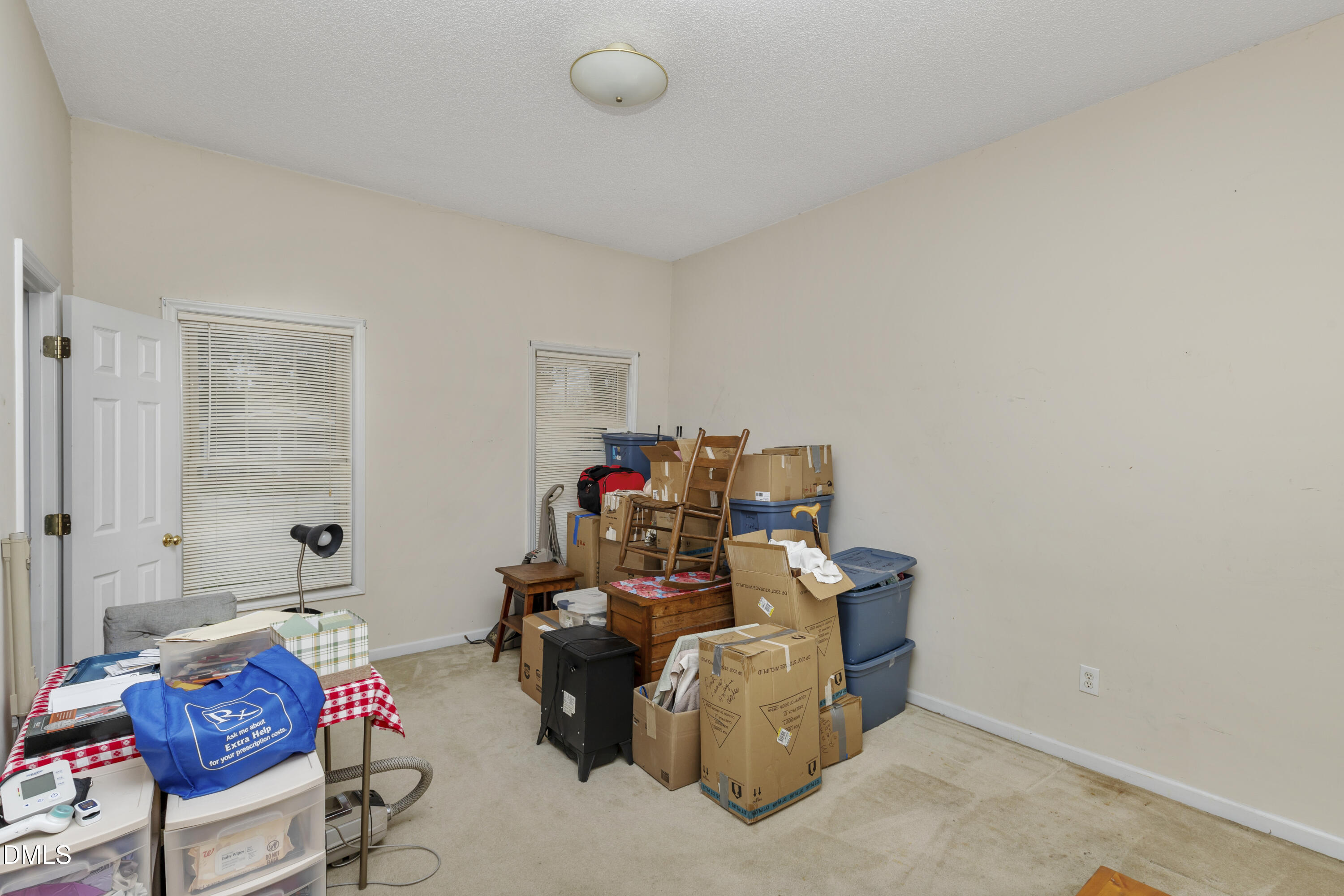 100 East E Street Erwin, NC 28339 - Photo 12 of 27 a view of a workspace with furniture