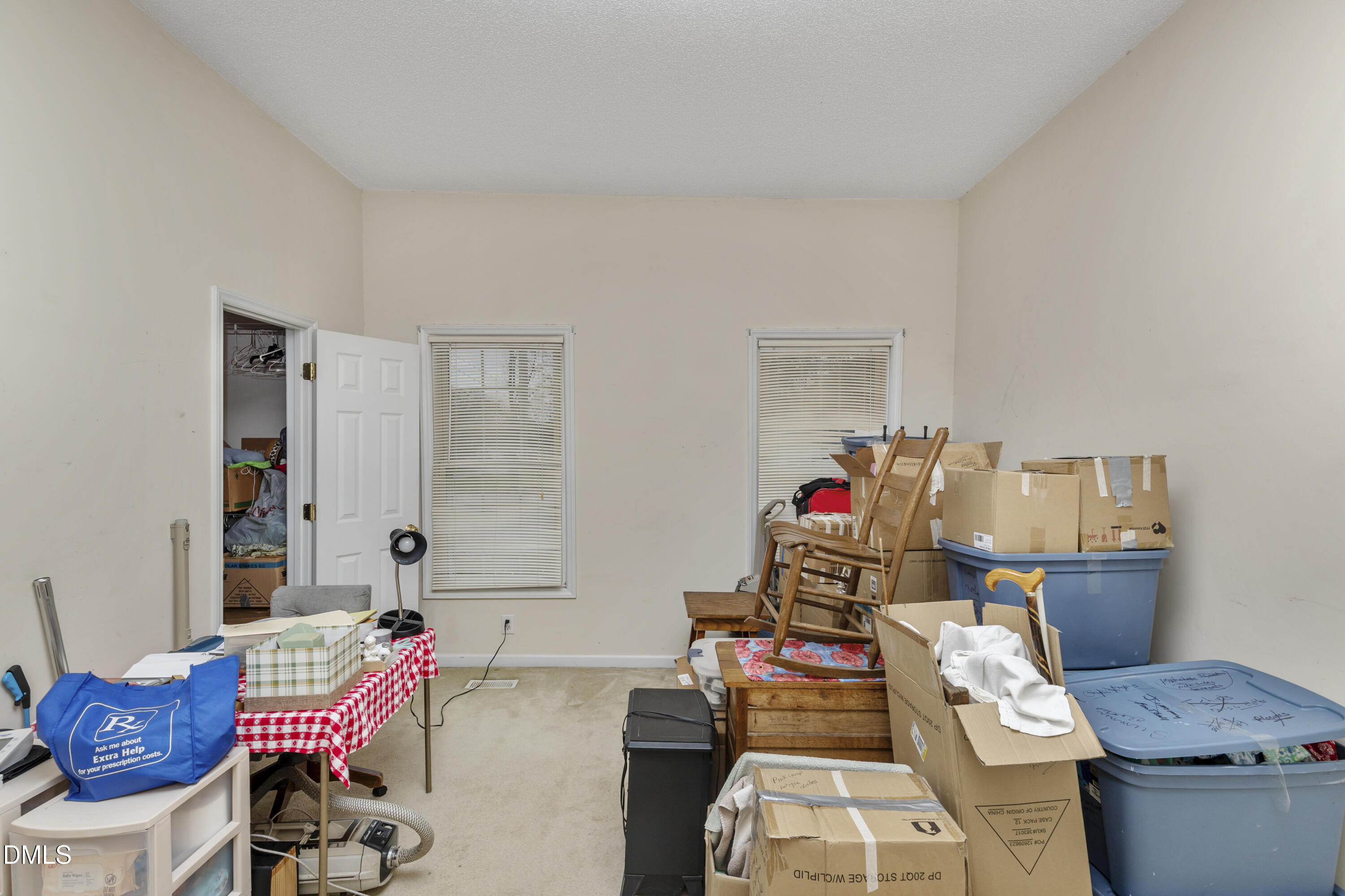 100 East E Street Erwin, NC 28339 - Photo 13 of 27 a living room with furniture and a wooden floor