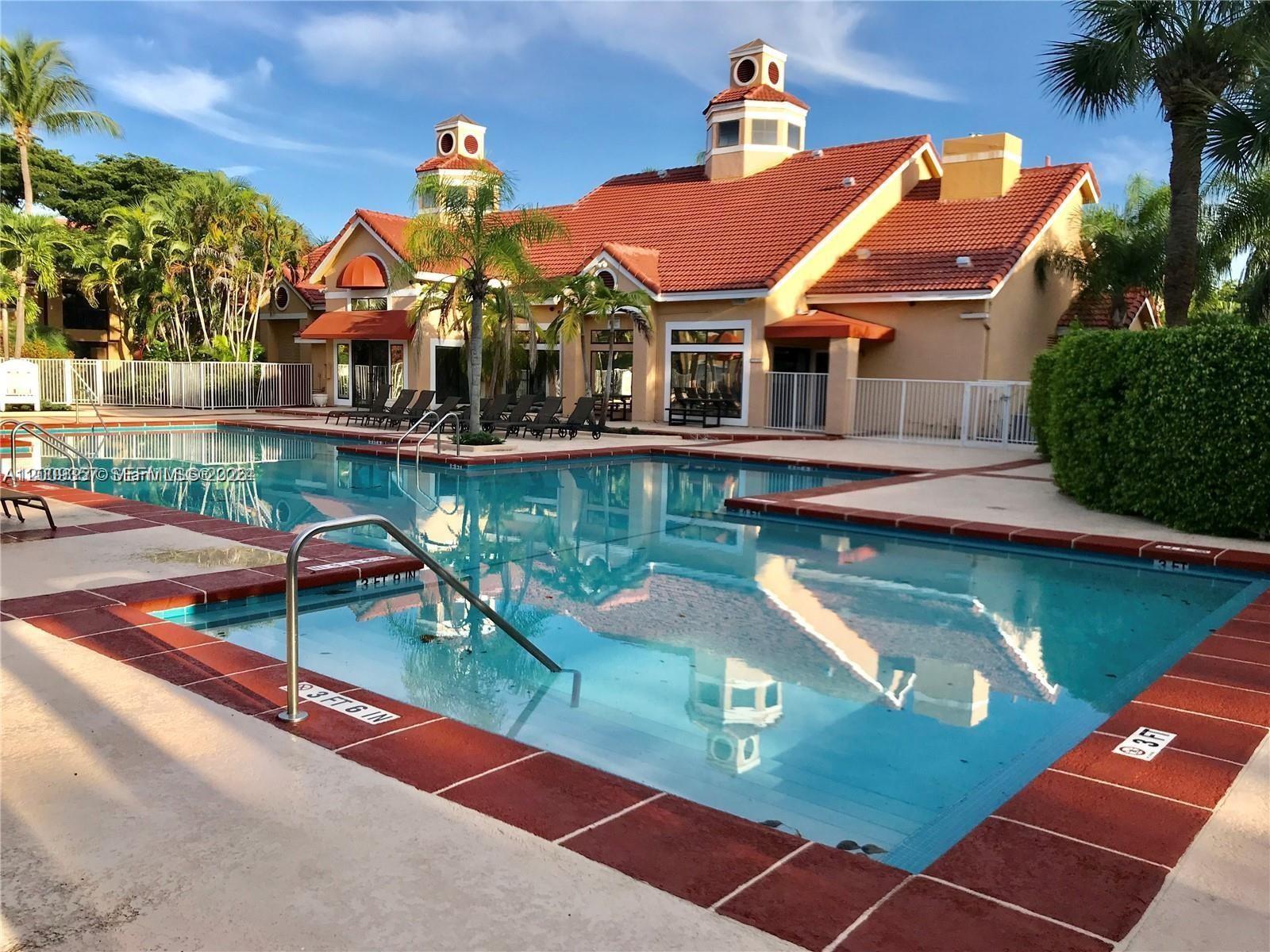 15551 Southwest 104th Terrace, Unit 814 Miami, FL 33196 - Photo 24 of 30 an aerial view of a house with swimming pool