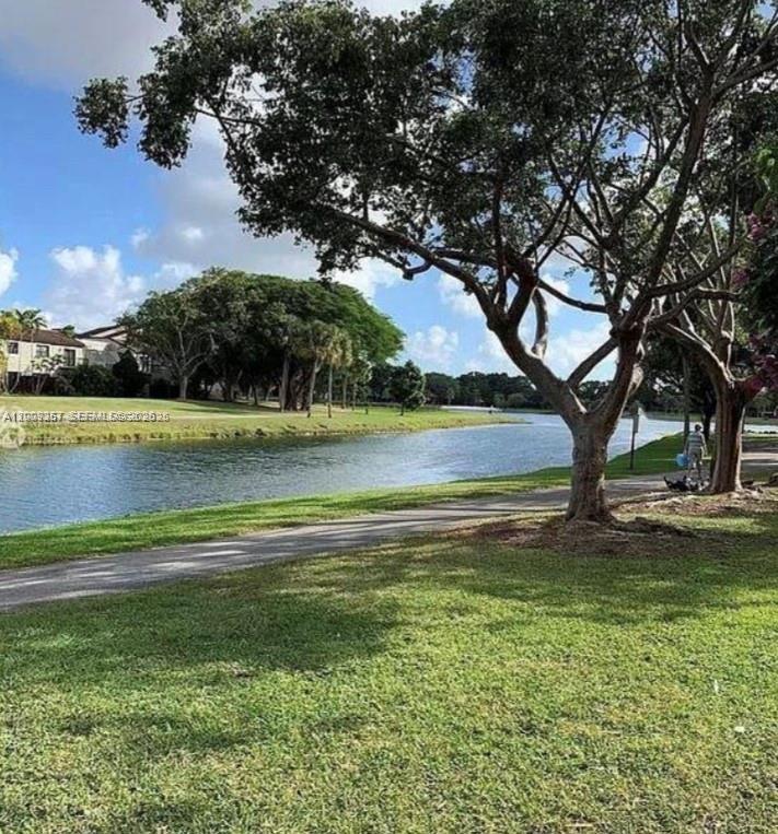 15551 Southwest 104th Terrace, Unit 814 Miami, FL 33196 - Photo 28 of 30 a view of a lake with a mountain