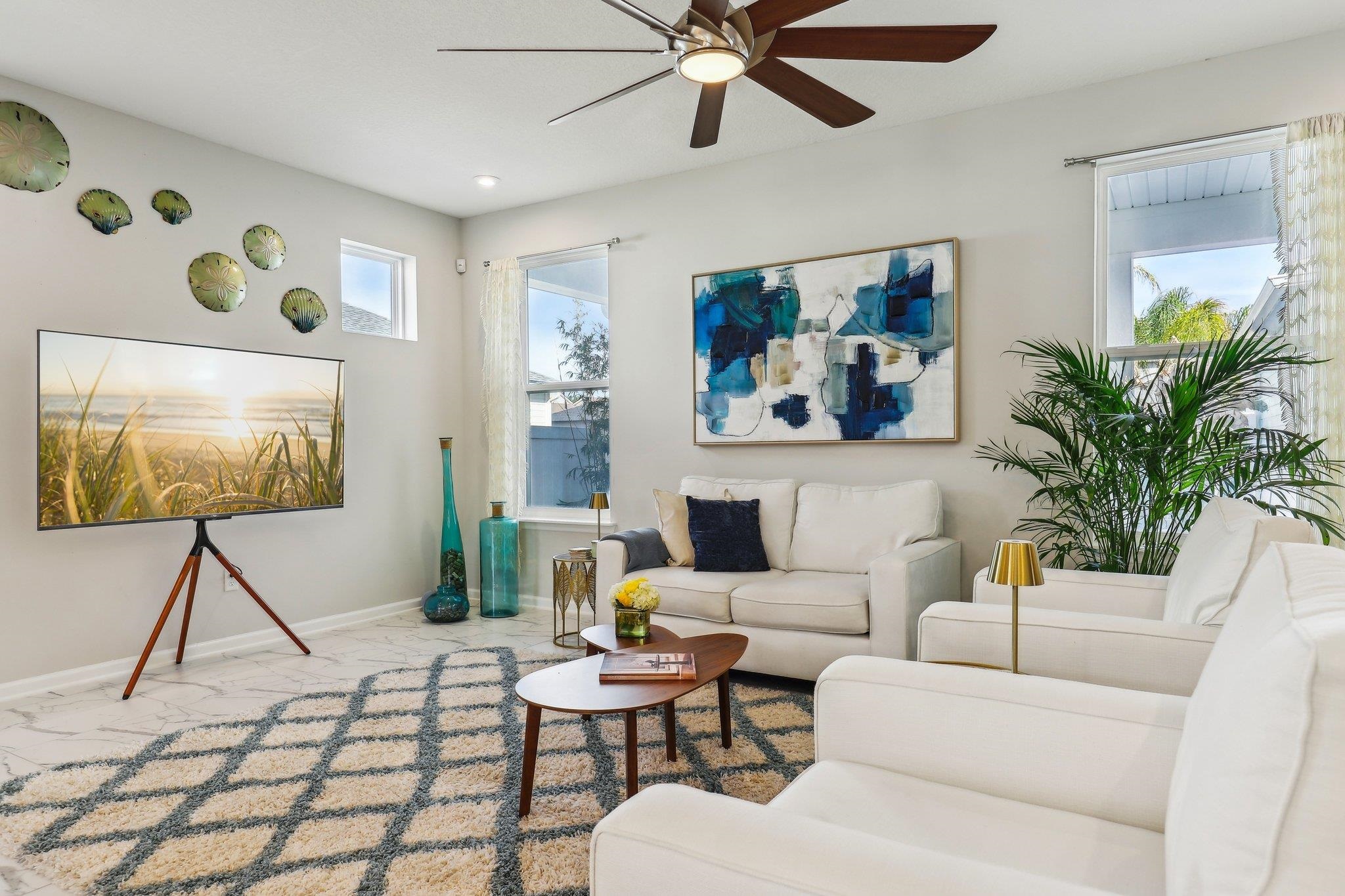 352 Footbridge Road St. Johns, FL 32259 - Photo 11 of 66 a living room with furniture and a potted plant