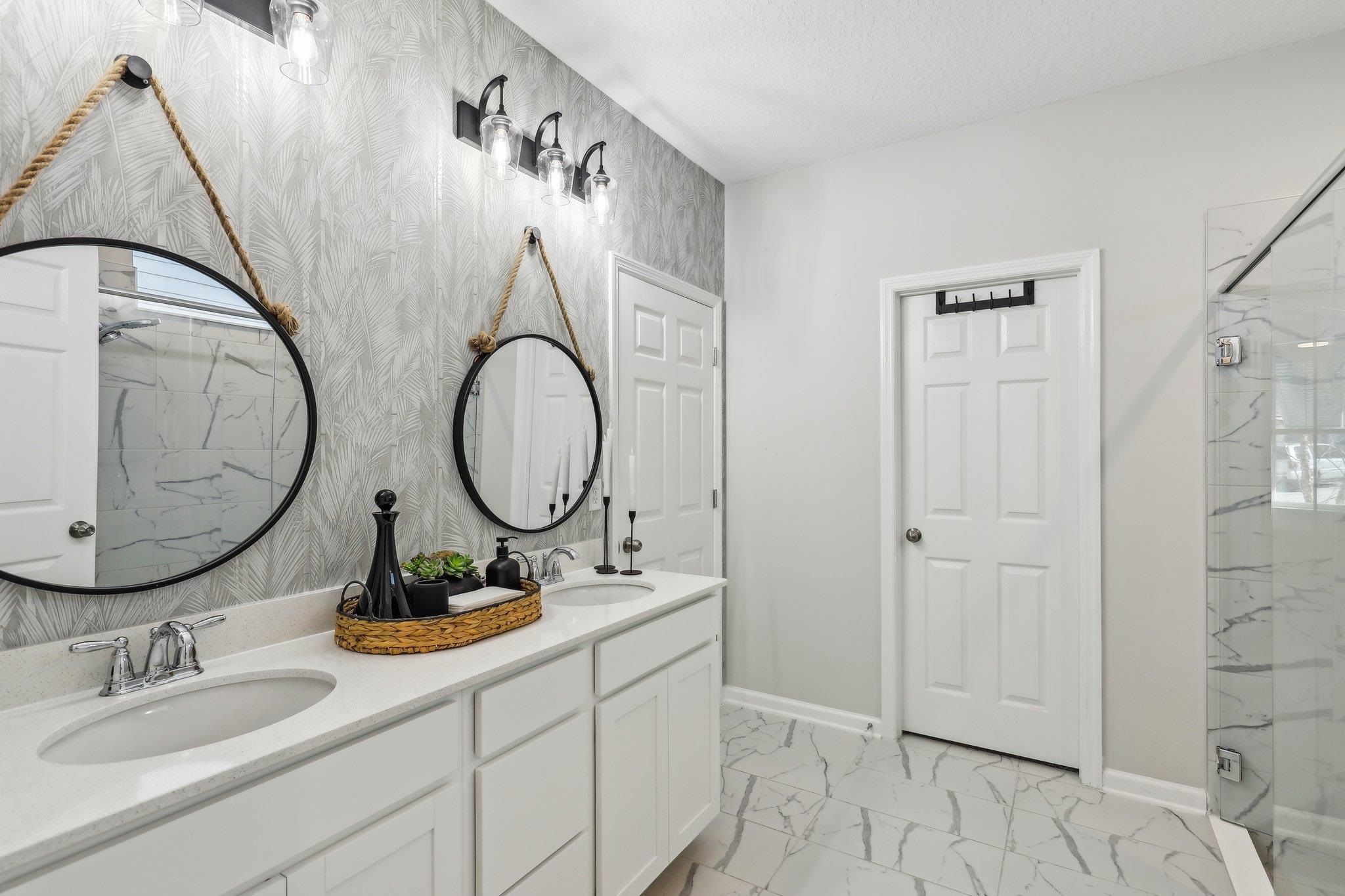 352 Footbridge Road St. Johns, FL 32259 - Photo 21 of 66 a bathroom with a sink and a mirror